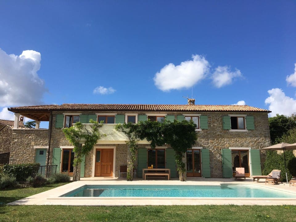 The front of the house showing the pool
