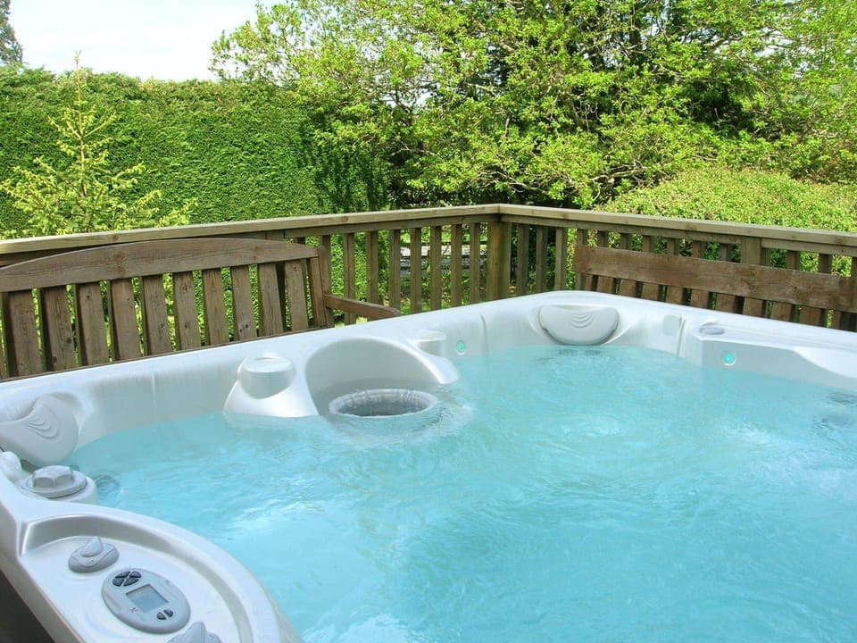 New 7 seater hot tub installed on new decking area.