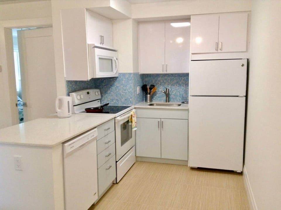 Kitchen with Fridg. dishwasher, stove, oven, micro, coffee maker