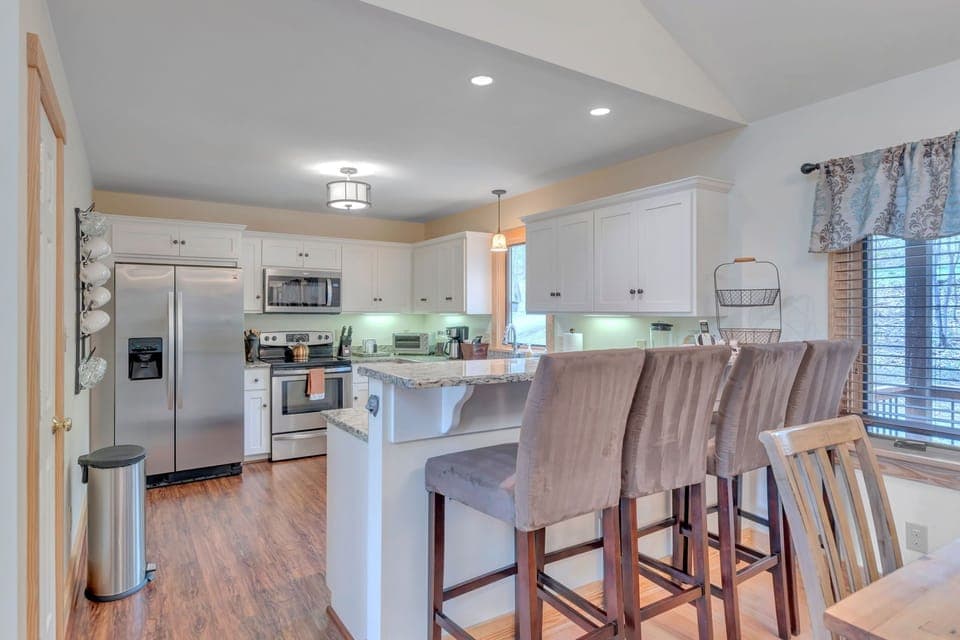Kitchen with bar seating for 4