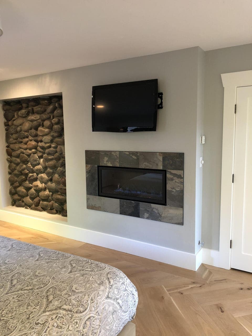 Master bedroom fireplace and TV.