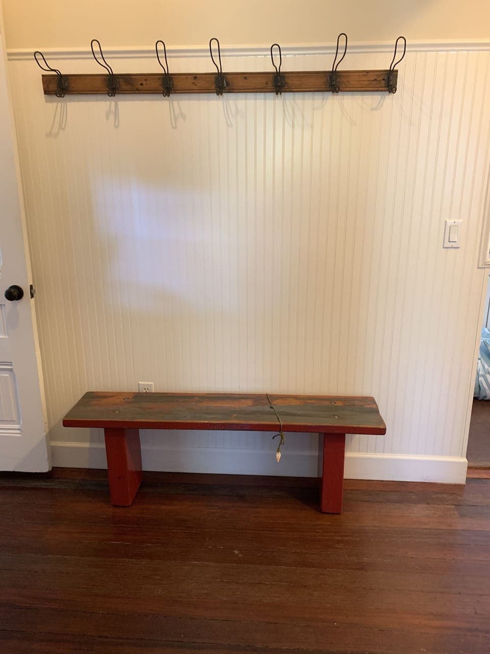 Hallyway with original hooks and bench from a local artist (price tag removed!)