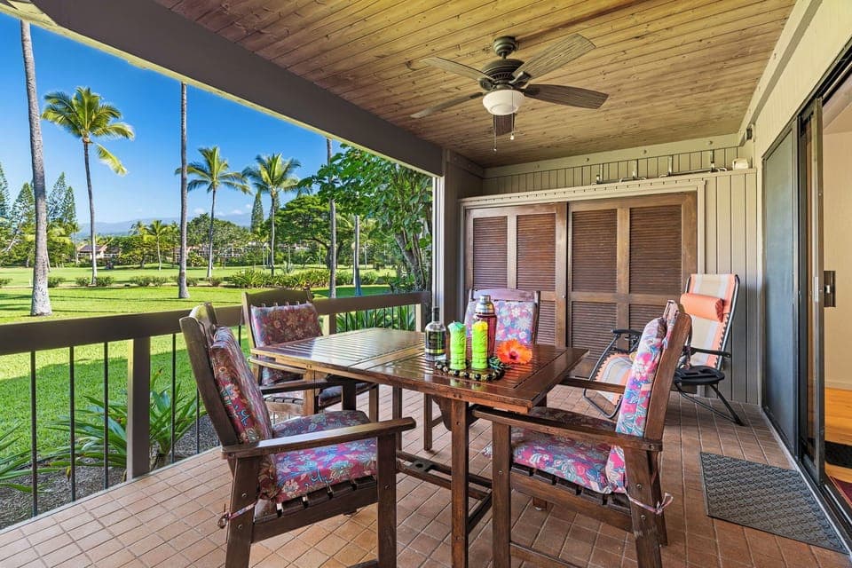 Sip your drink of choice on this charming lanai with golf course views and gentle trade winds cooling your private retreat.