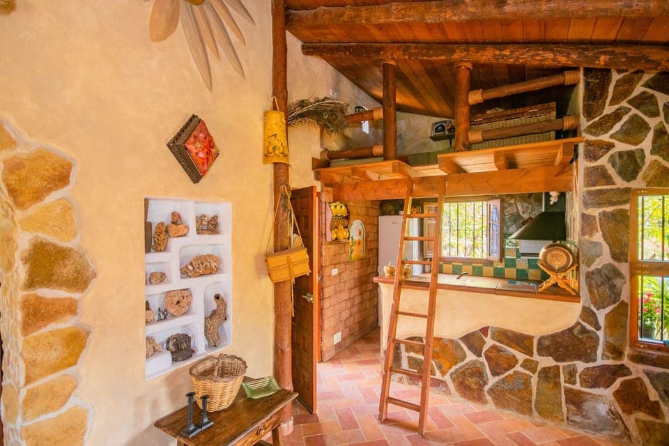 Enjoy the living room of this rural house in Guaro