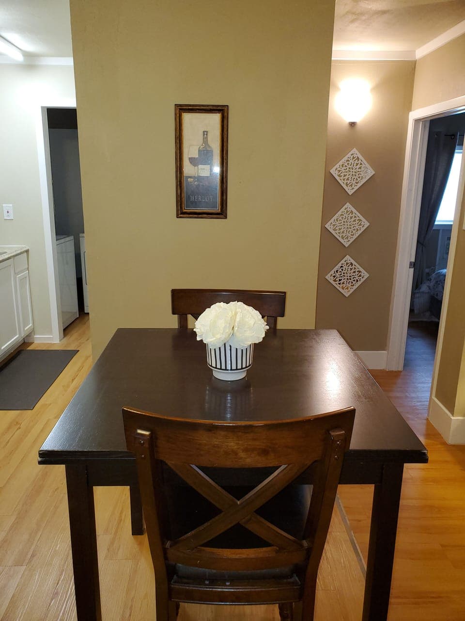 Expandable dining table (extra chairs available)