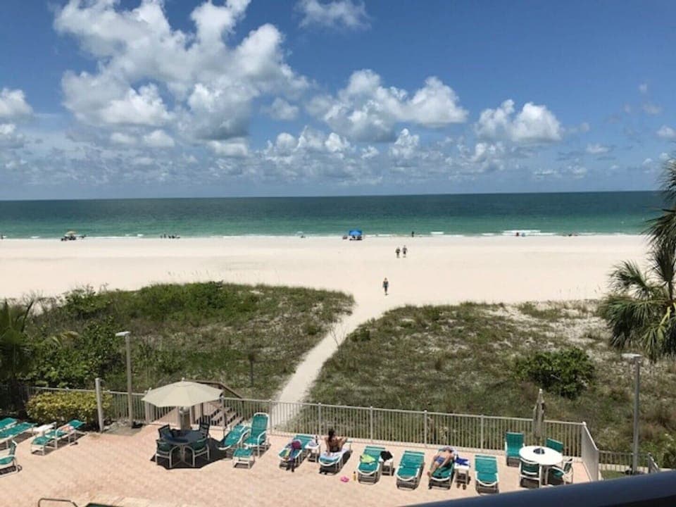 Walkway to the sandy beach & clear Gulf water