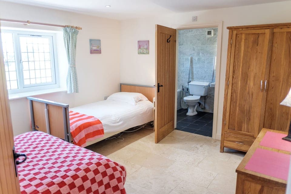 Downstairs bedroom, with profiling bed, if required.