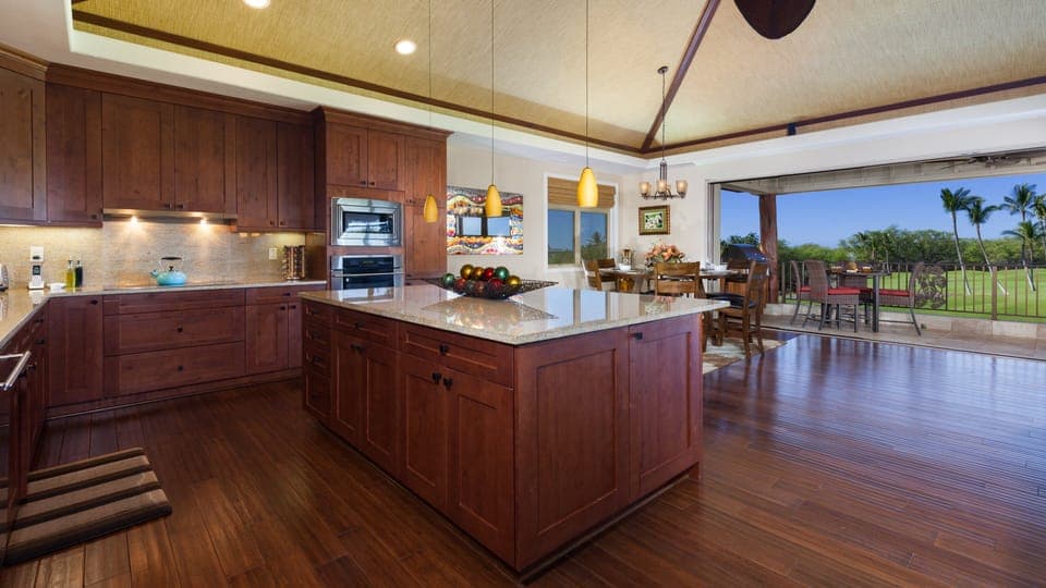 Large kitchen equipped with spices and oils