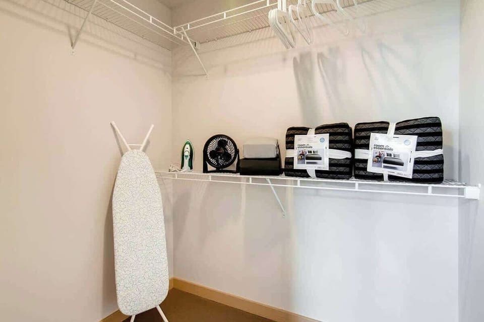 Plenty of extra linens and comforters are included as well as an iron, ironing board, and many essentials. 