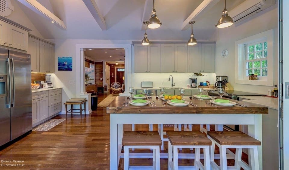 The kitchen has high-end stainless-steel appliances and every tool needed to prepare a meal at home...