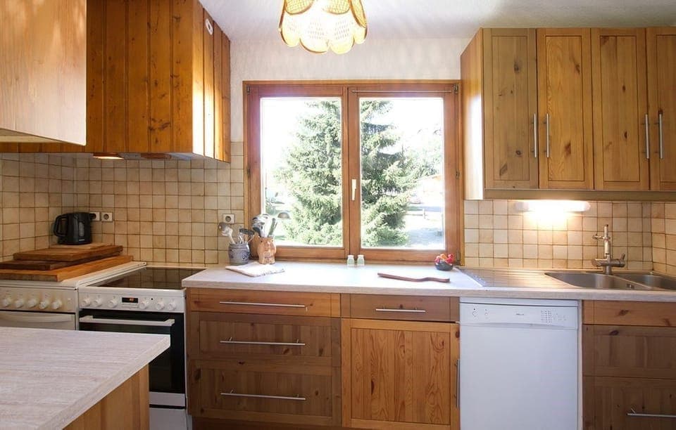 Cook a meal in the kitchen.