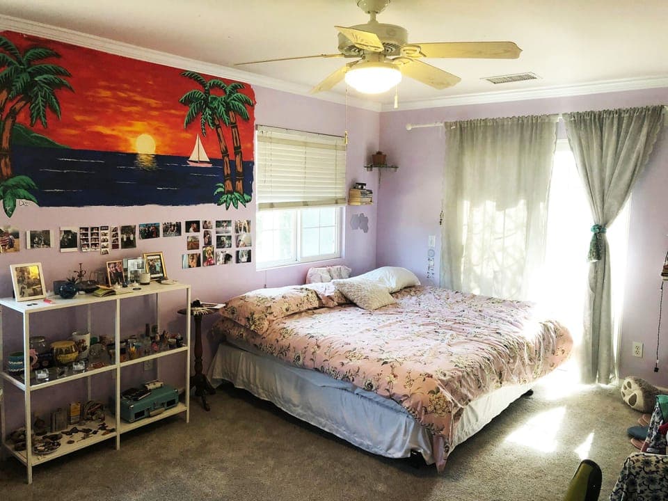 Upstairs bedroom with King sized bed and pool view