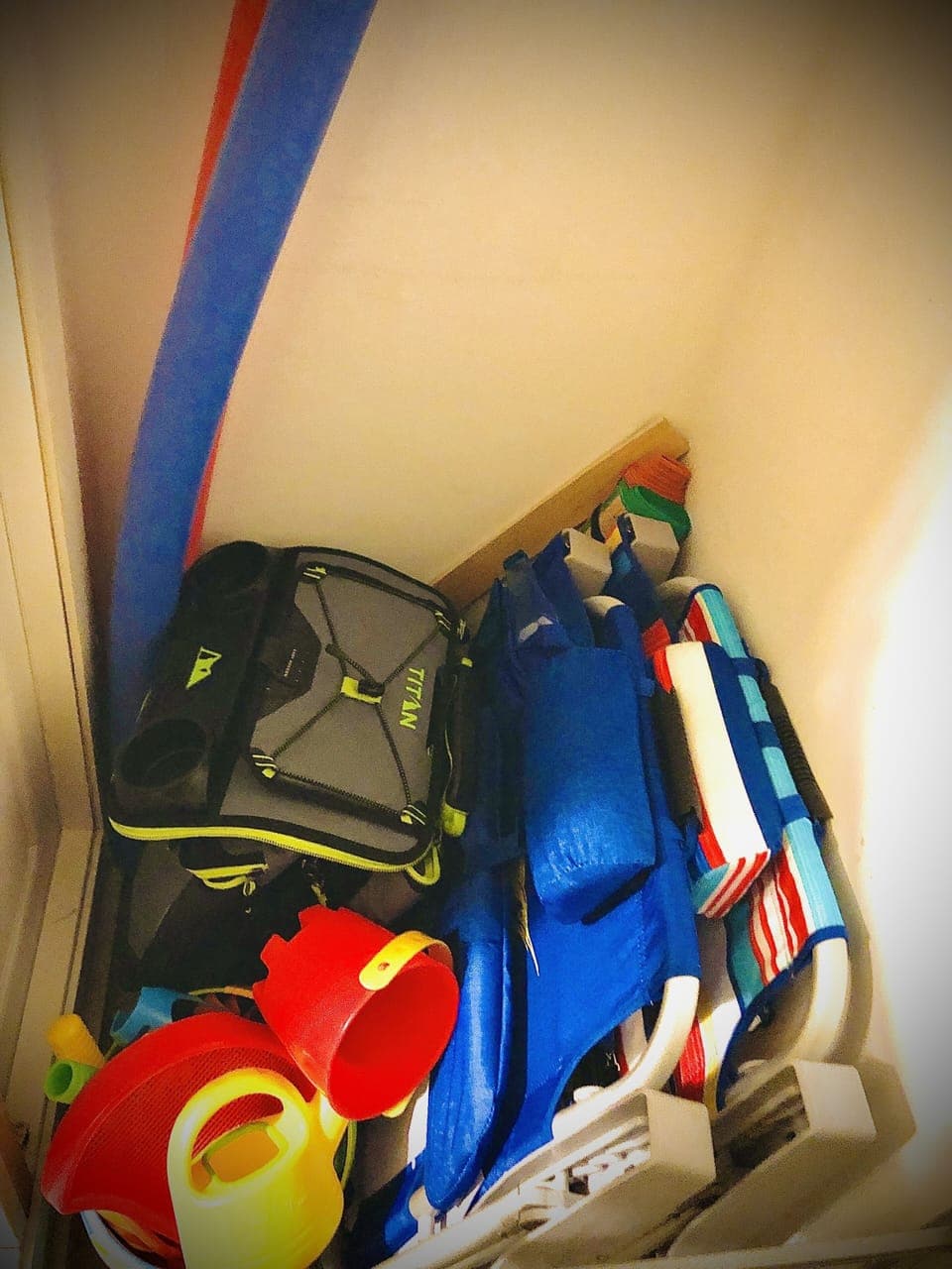 Beach accessories in the apartment - chairs - cooler - inflatables - sand toys