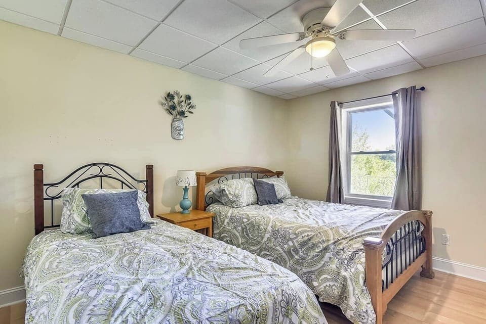 Apartment bedroom.  Queen bed. Single bed.