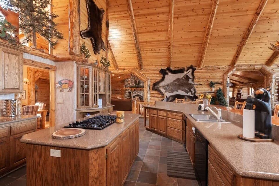 Majestic Kitchen opens to  both Living Areas. Gorgeous views of the lake.