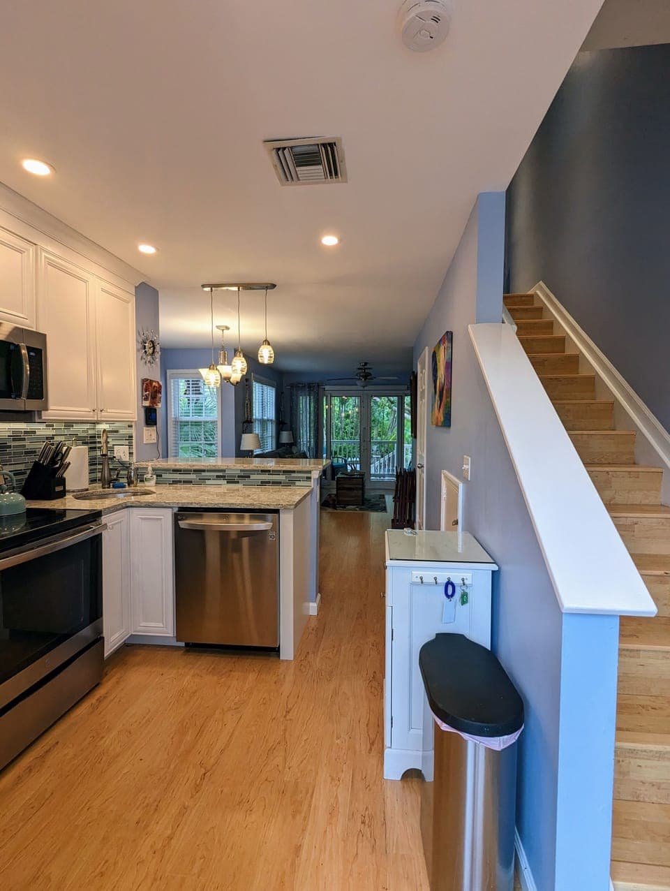 Open the front door to a bright spacious living space. 