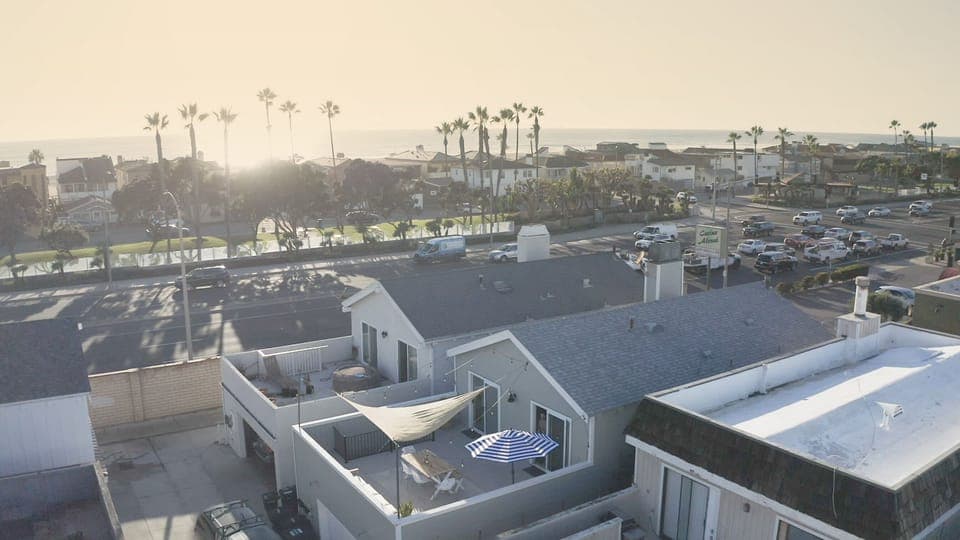 Beach Happy is the unit with the sun sail and fully furnished back deck!