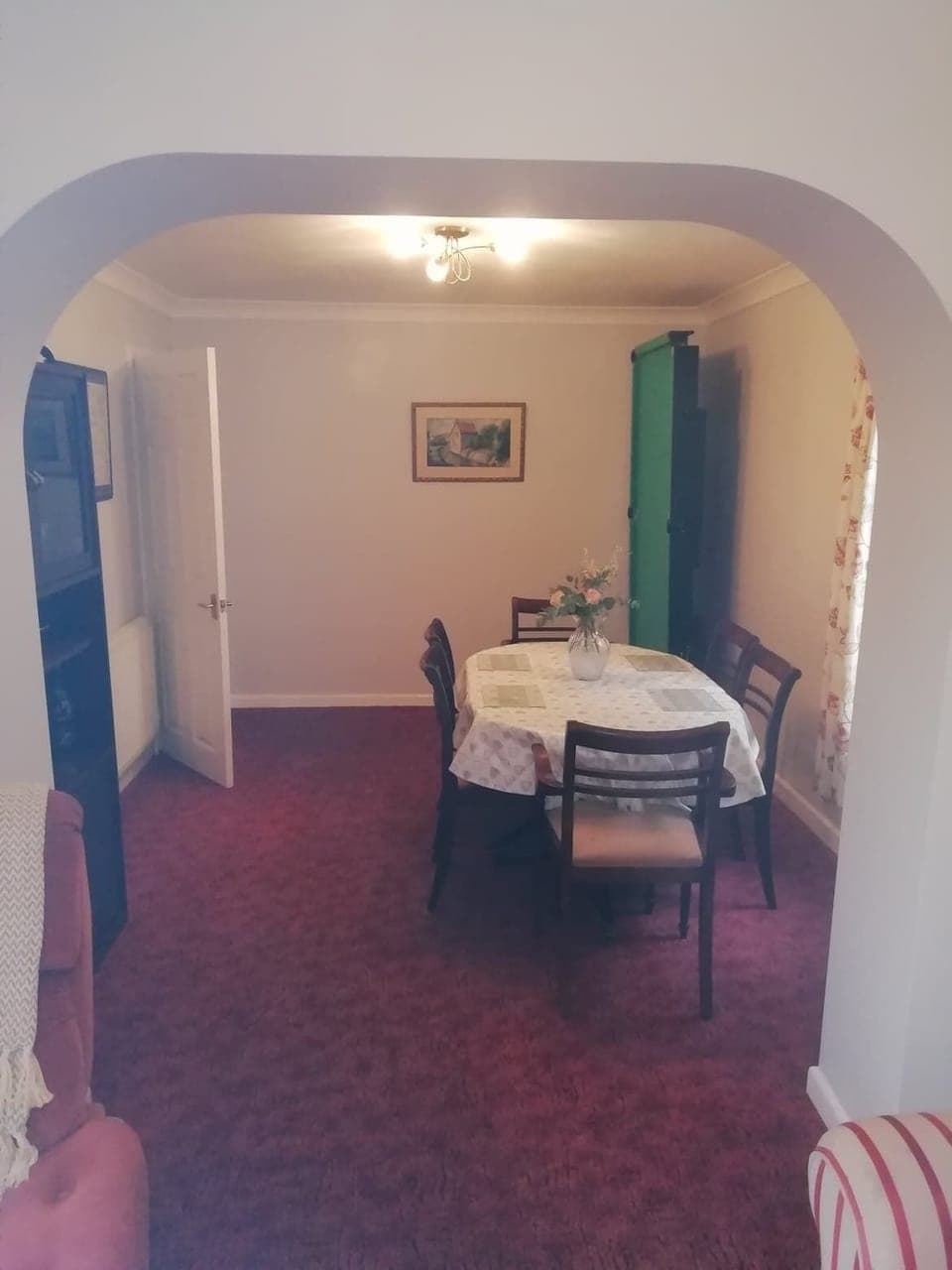 A large & spacious living area/dining room with access directly to the patio.