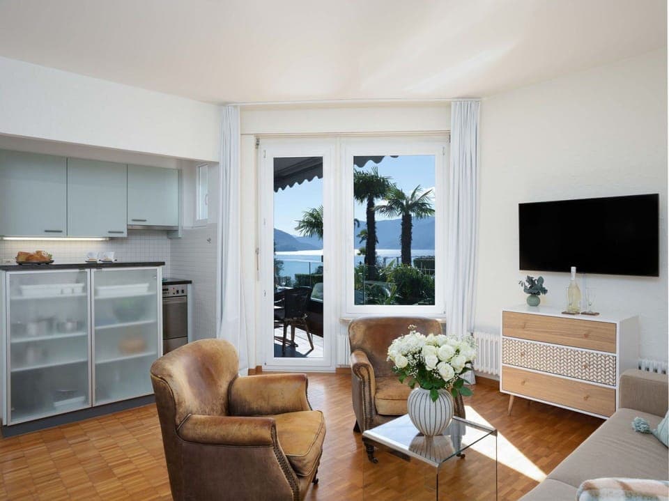 Furniture, Interior Design, Table, Room, Flooring, Floor, Ceiling, Living Room, Couch, Chair