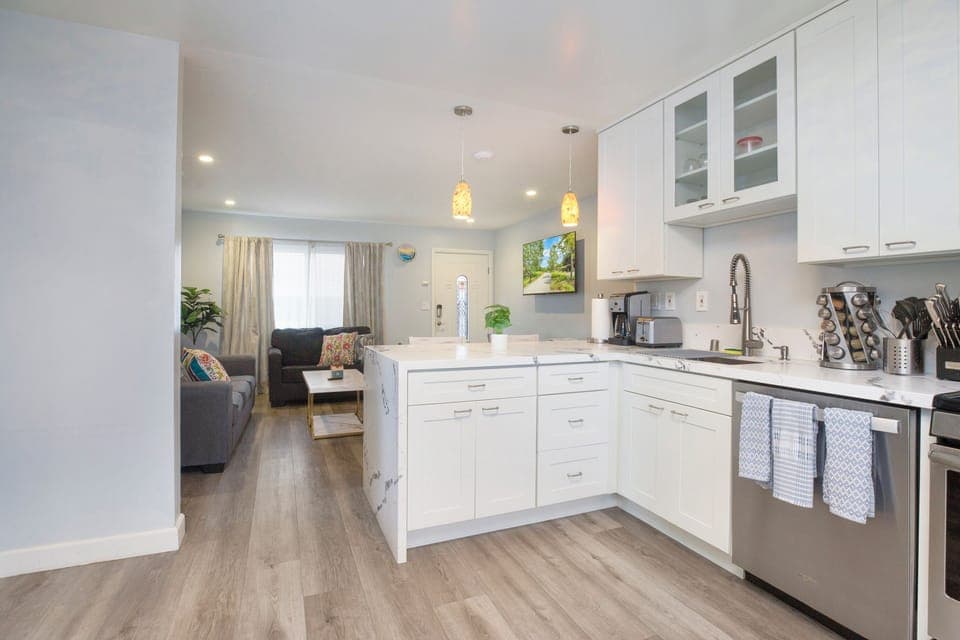 The kitchen is well stocked with cookware, utensils, silverware, and glassware.  Permit #str14-0085