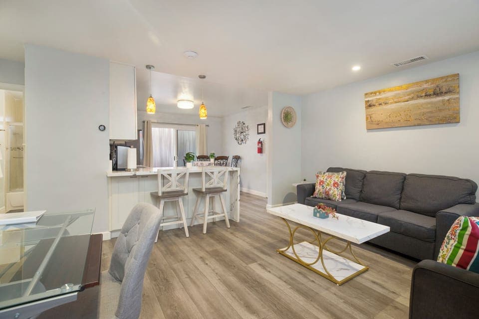 Relax in the comfort of this living room after a day at the Beach. Permit #str14-0085 