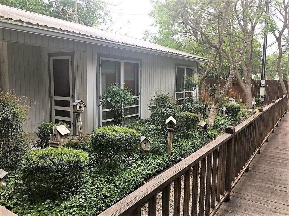 Beautifully landscaped farmhouse charm