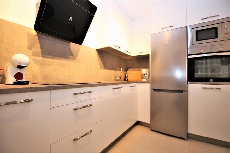 Modern kitchen is fully equipped with all the appliances