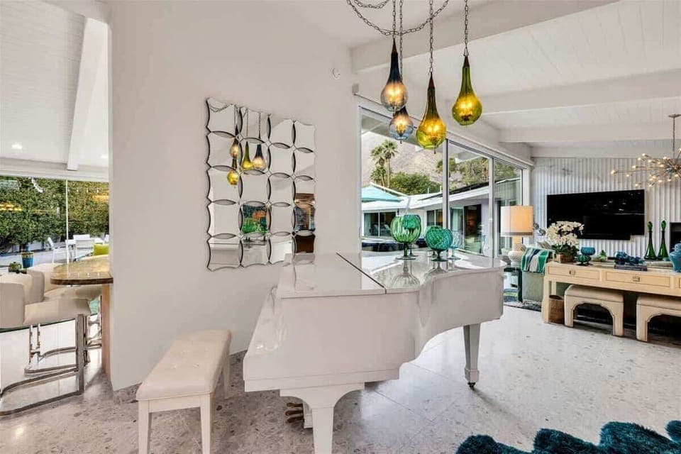 Create lasting memories around the baby grand piano, where you can play your favorite show tunes and let the music take you away. Gather friends for a night of laughter and fun, as melodies fill the air and joy abounds!