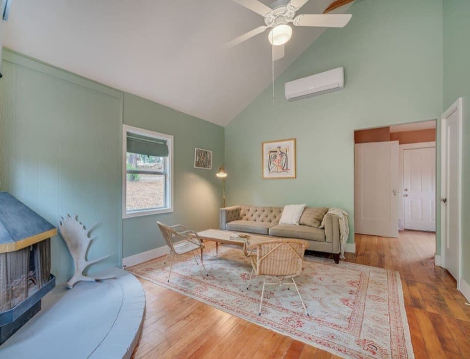 Peaceful colors put you at ease in your home away from home.  This is the living room.