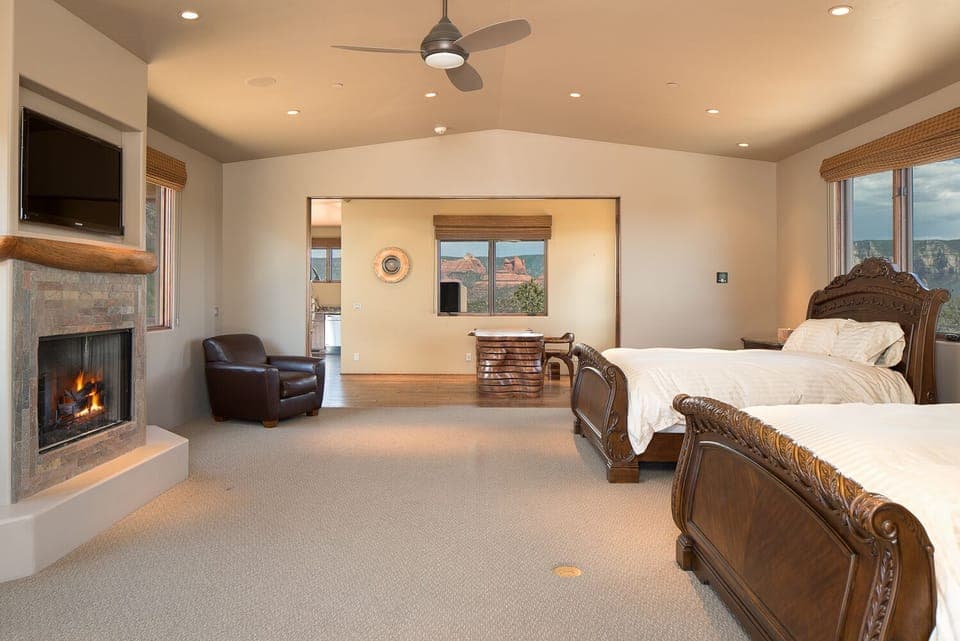 Bedroom 5 is upstairs and is spacious with 2 Queen Beds