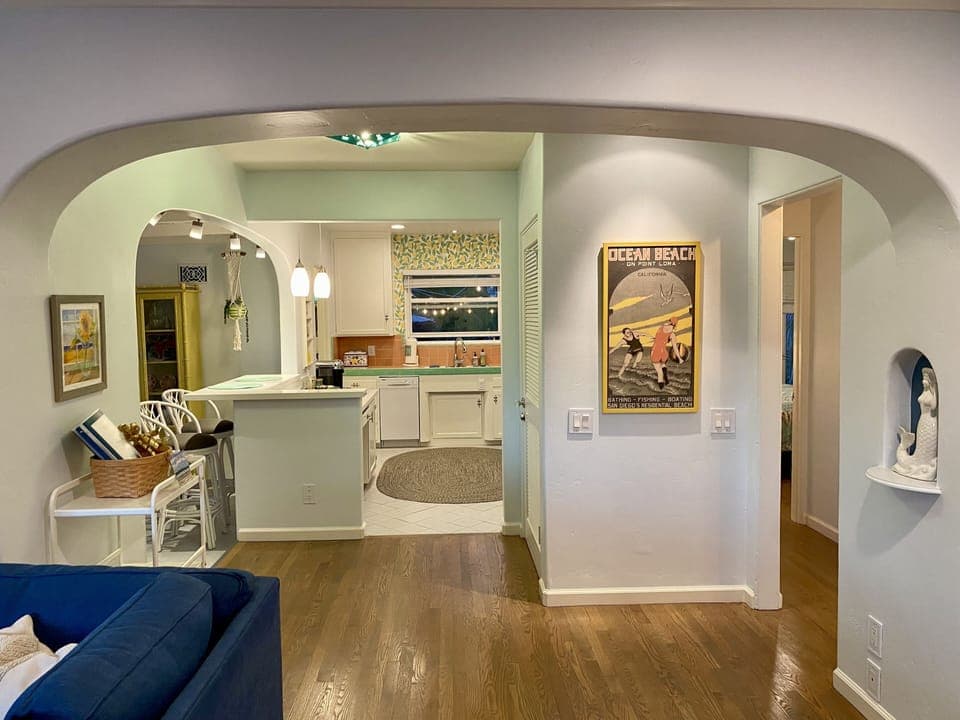View into the kitchen, hallway on the right to the bedrooms and full bath.