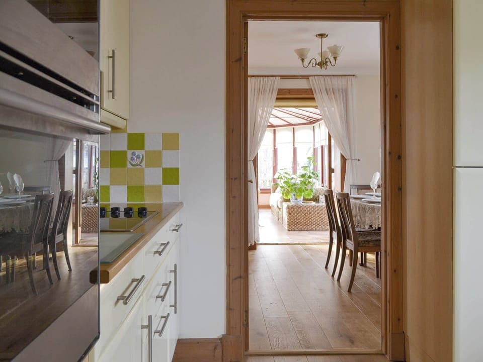 Well-equipped fitted kitchen | Rowan Cottage, Aviemore