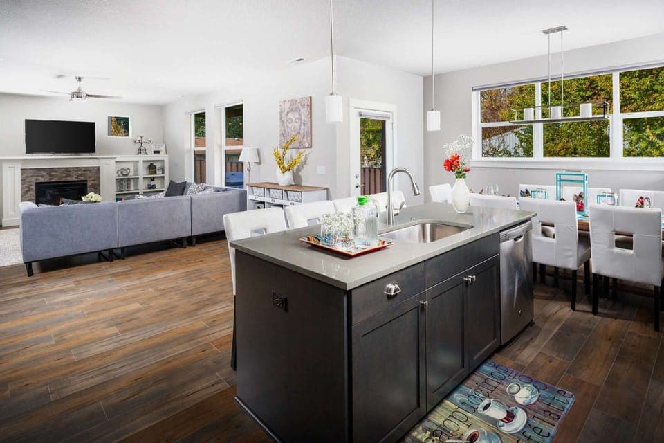 Lots of space in the living room to the kitchen and dinning room for seating and for playing board games and just spending time with the whole family.