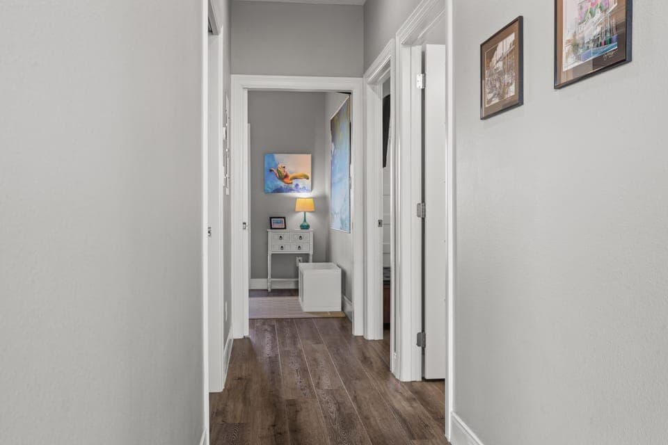 Hallway leads to the bedrooms and the 2nd bathroom