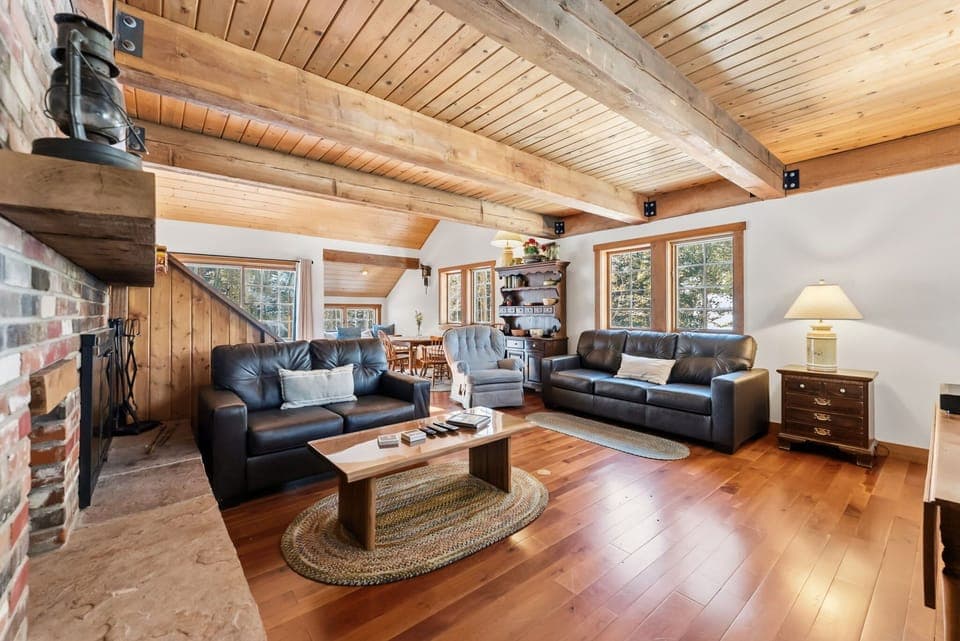 Living room: Wood-burning fireplace, Smart TV, forced heat, no A/C