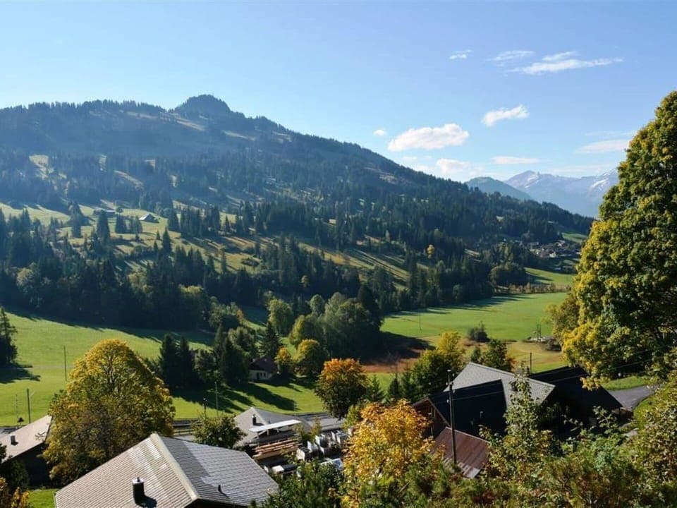 Sky, Cloud, Mountain, Plant, Natural Landscape, Natural Environment, Tree, Highland, Building, Sunlight