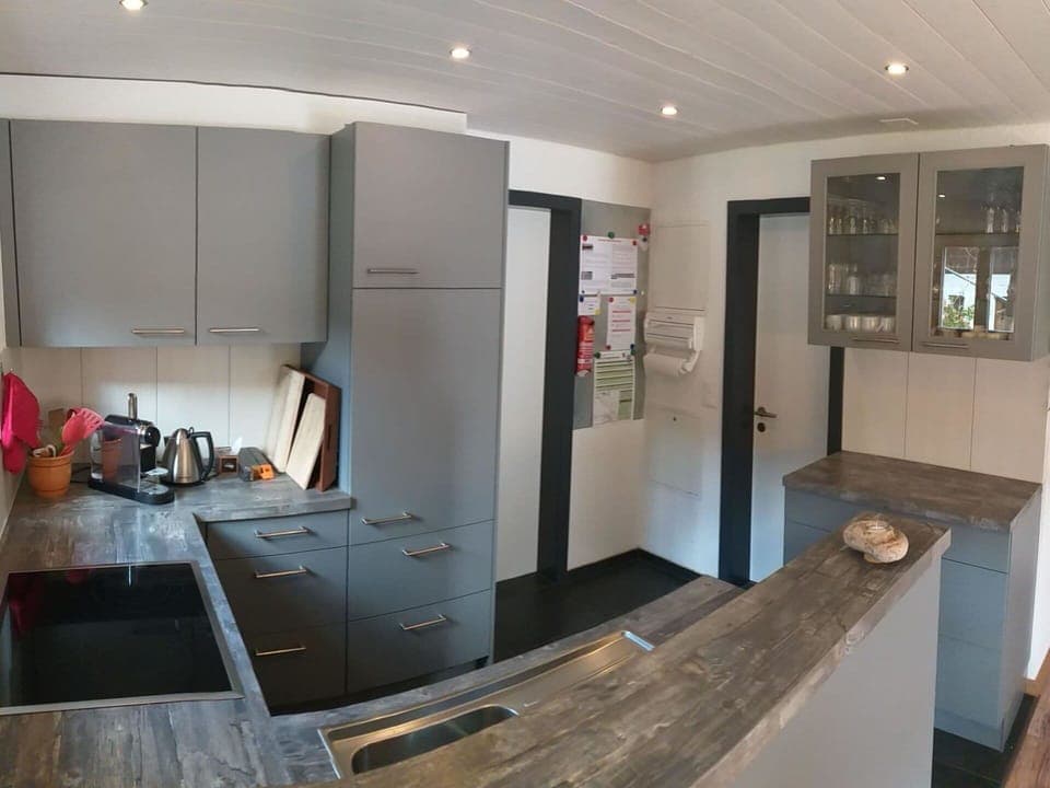 Cabinetry, Building, Countertop, Wood, Door, Lighting, Interior Design, Hall, Floor, Flooring