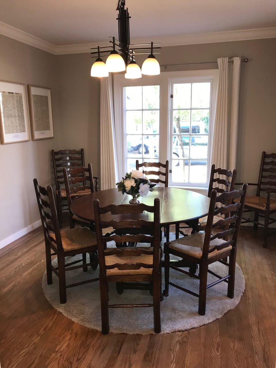 Formal dining room with antique English table and chairs.