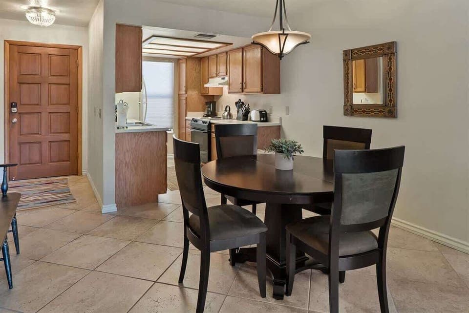 The dining table seats 4 guests