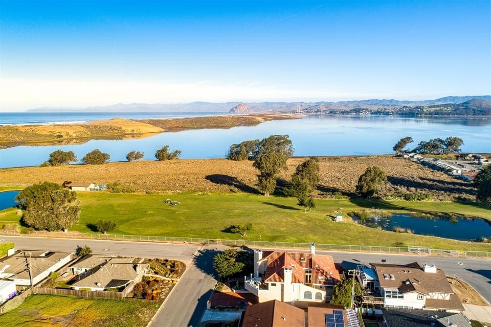 This wonderful home is located in Los Osos and features views of the golf course and Bay