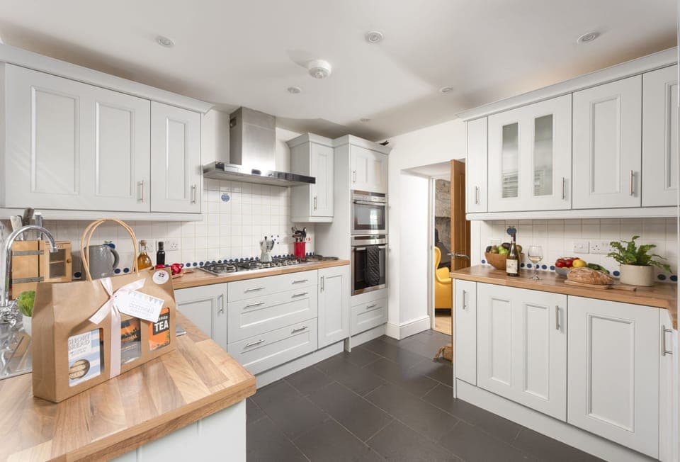 Adanac, Sennen Cove. Ground floor: Cook up delicious family dinners in the charming kitchen