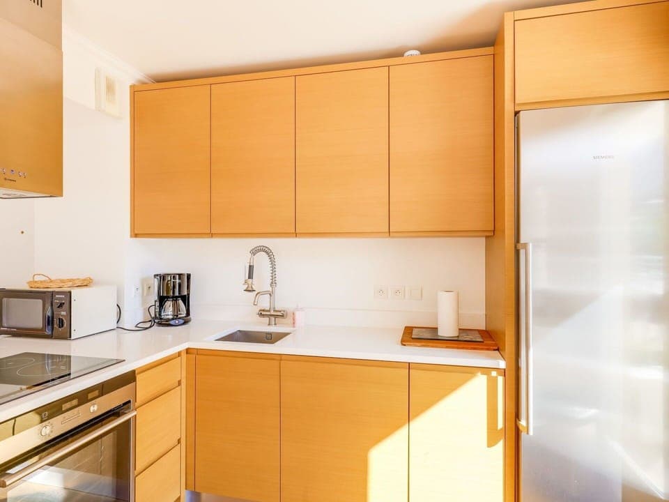 Countertop, Cabinetry, Room, Property, Kitchen, Furniture, Orange, Interior Design, Yellow, Cupboard