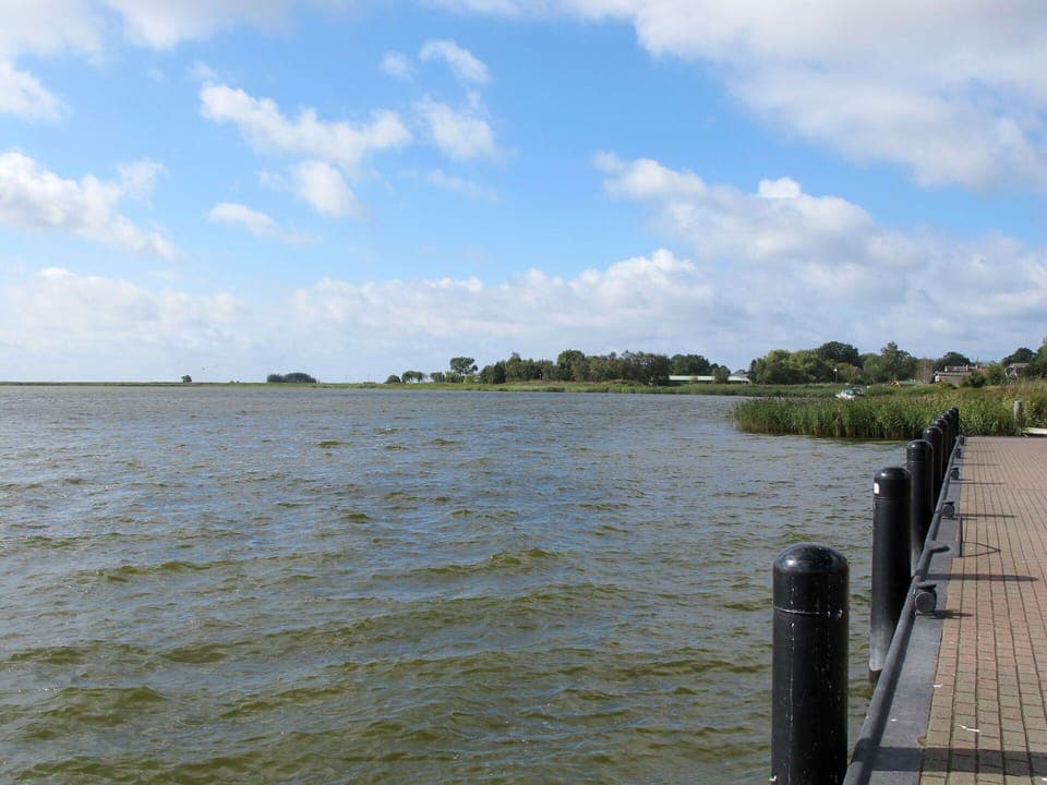 Sky, Property, Plant, Tree, Building, Land Lot, Slope, Shade, Asphalt, Wood