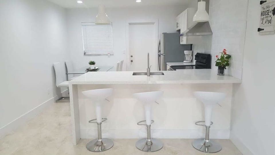 Come enjoy a modern style home and newly renovated 2 BR duplex apartment.