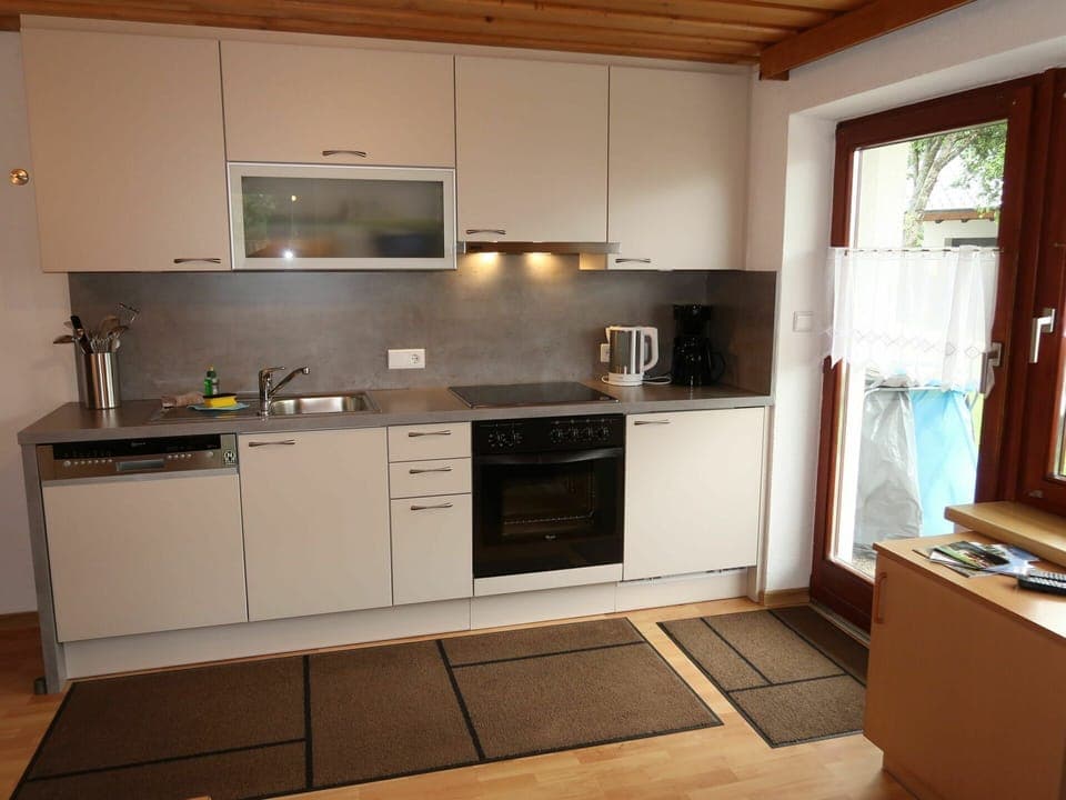 Cabinetry, Countertop, Property, Kitchen Sink, Sink, Kitchen Appliance, Kitchen Stove, Tap, Kitchen, Wood