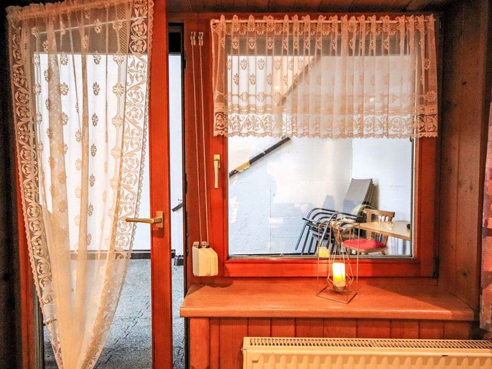 Wood, Interior Design, Window Covering, Window Treatment, Textile, Curtain, Lighting, Brown, Furniture, Room