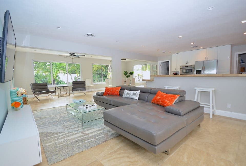 Open Living Features Leather Sectional + 65" 4K Smart TV + Leather Chairs...