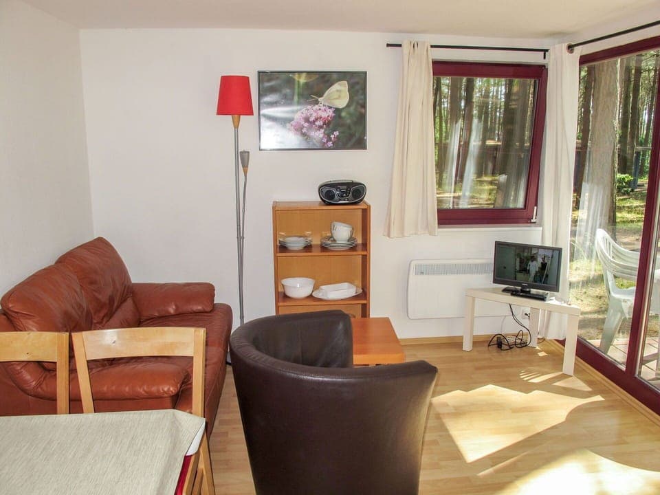 Furniture, Property, Chair, Television, Table, Wood, Comfort, Building, Picture Frame, Textile