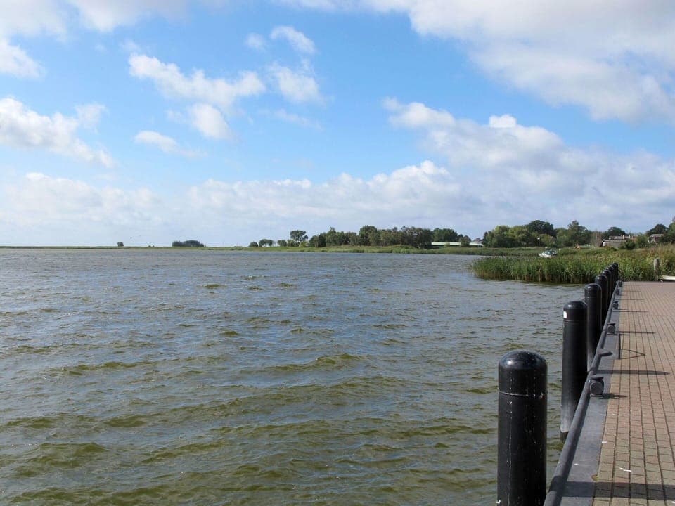 Sky, Property, Plant, Tree, Building, Land Lot, Slope, Shade, Asphalt, Wood