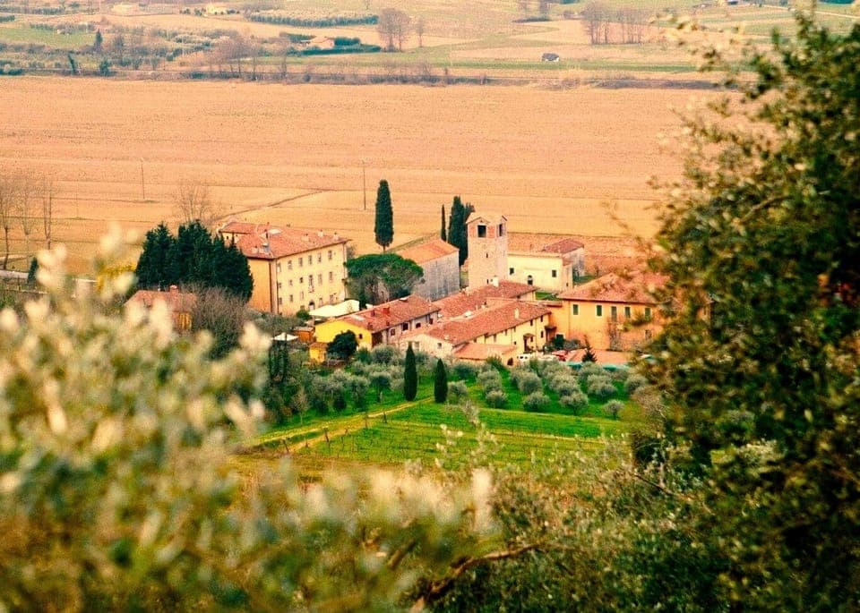 Views of the delightfully quaint village of Pugnano at the bottom of the hill.